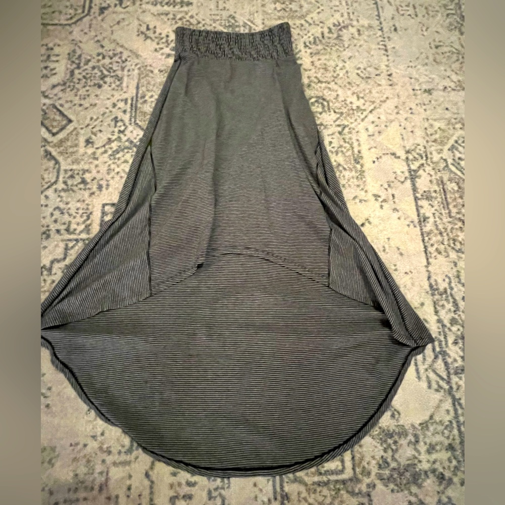 XS, trailing skirt (long back, shorter front) T-shirt material.